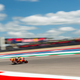 Marc Marquez flies around a damp track to grab the pole position during qualifying.
